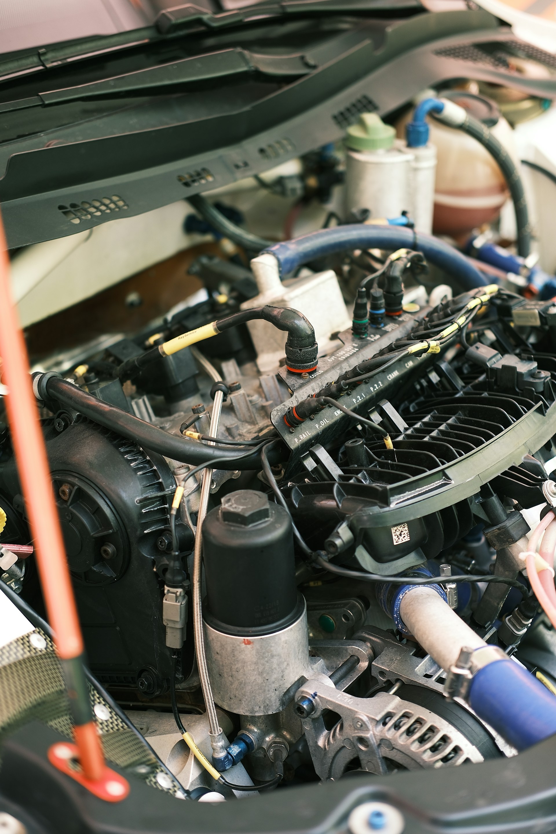 Open engine compartment during a drivetrain inspection